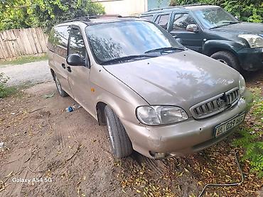 Kia: Kia Carnival: 2000 г., 2.5 л, Механика, Бензин, Минивэн — 1