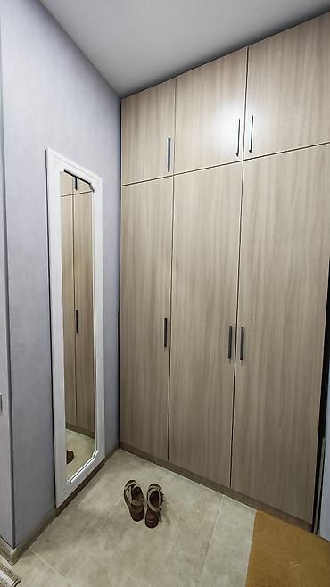 memar ecemi ev alqi satqisi: Satılır: işıqlı və zövqlə dizayn edilmiş 2 otaqlı mənzil (studia tipli — 7