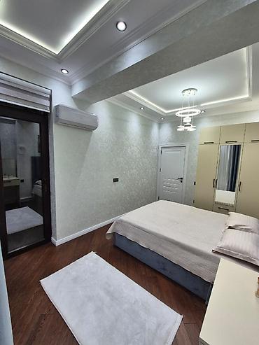 susə satisi: Mənzilin təsviri - Şəhər panoramalı geniş balkon: gecə işıqlı park və — 2