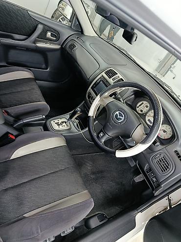 Mazda: Mazda Familia: 2001 г., 2 л, Автомат, Бензин, Универсал — 5