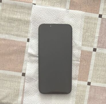 QAZ: IPhone 14, Qara, Face ID