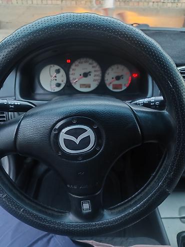 Mazda: Mazda 323: 2000 г., Универсал — 11