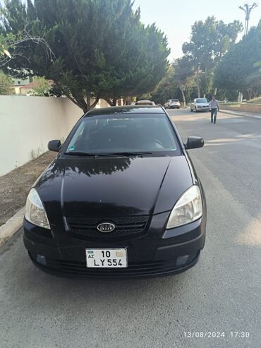 kia k5 qiymeti azerbaycanda: Kia Rio: 1.4 l | 2005 il Hetçbek