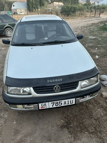 панель приборов ауди: Серебристый седан Volkswagen Passat B4 с черным защитным чехлом на
