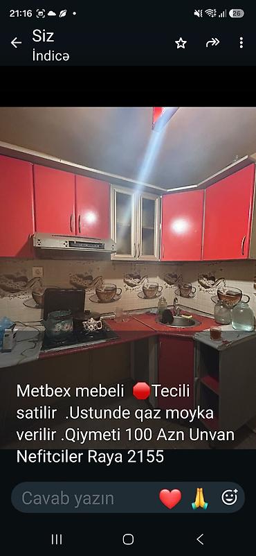 Mətbəx mebeli satılır. Qırmızı rəngli üst şkaflar, künc modulu və
