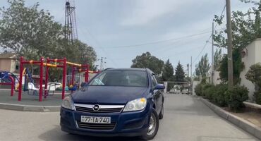 Opel: Opel Astra H Caravan (universal), göy rəng. - Kuzov: universal — 12
