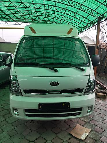 mazda 323 2003: Kia Bongo (K-Series) — компактный грузовой фургон/бортовой Гигант 1.2 — 1