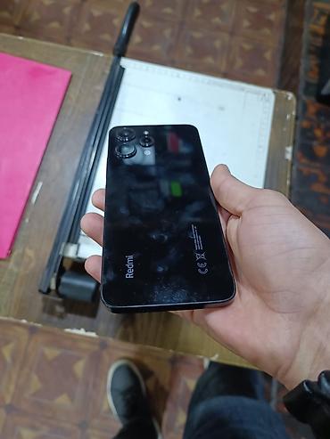redmi note 13 256 gb: Xiaomi 12, 256 GB, rəng - Qara, 
 İki sim kartlı, Face ID, Sənədlərlə — 3