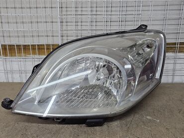 Передние фары: Передняя левая фара Peugeot 2009 г., Б/у, Оригинал, Германия — 2