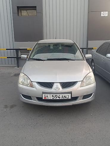 lancer: Mitsubishi Lancer: 2003 г., 1.6 л, Механика, Бензин, Универсал — 5