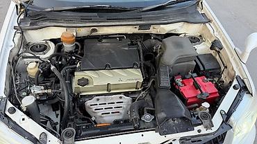 lancer 9: Mitsubishi Outlander: 2004 г., 2.4 л, Автомат, Газ, Кроссовер — 9