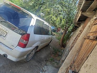 мисубиси спейс стар: Mitsubishi Chariot: 1999 г., 2.4 л, Автомат, Бензин, Минивэн — 1