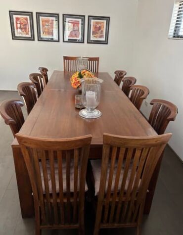 Beautiful wooden table and 14 chairs. 3 meters long and 1.15 meters