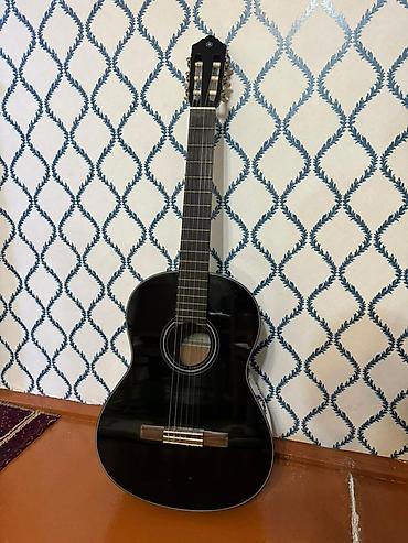 qara canta: Klassik akustik gitara + çanta dəsti
Real alıcılara endirim var — 1