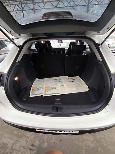 Другие автомобили: NETA V — компактный пятидверный электрический кроссовер в белом цвете — 9