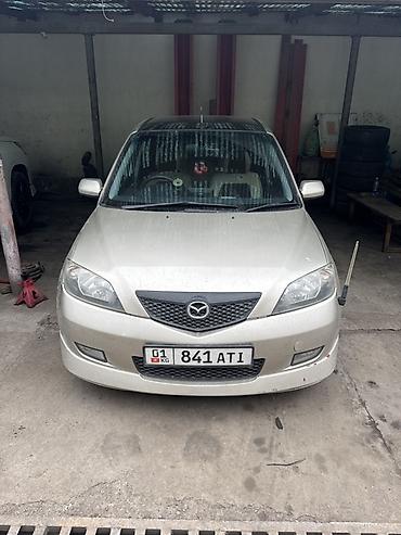 боковой тырмоо: Mazda Demio: 2003 г., 1.5 л, Автомат, Бензин, Хэтчбэк — 1