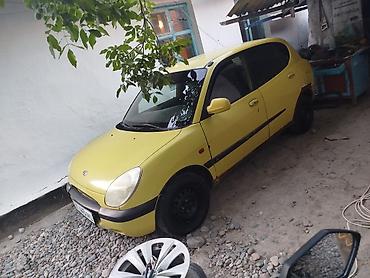 муалим сани: Daihatsu Sirion: 1999 г., 1 л, Механика, Бензин, Хэтчбэк — 4