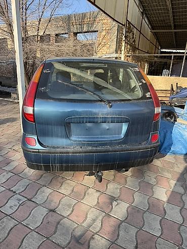 самосвал фав: Nissan Almera Tino: 2003 г., 1.8 л, Механика, Бензин, Минивэн — 1