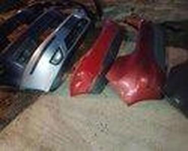 Branici: BRANIK PREDNJI ZADNJI ZA FORD C-MAX, COUGAR, ESCORT . OD 2002. DO — 44