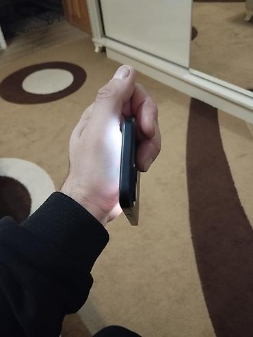 Apple iPhone: IPhone 15, 128 GB, Qara, Face ID — 2