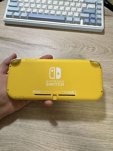 nintendo switch lite ikinci el: Nintendo Switch Lite oyun konsolu, ideal veziyyetdedir, seliqeli — 4