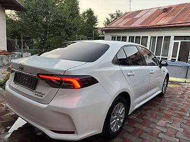 120 prado: Toyota Corolla: 2022 г., 1.8 л, Вариатор, Гибрид, Седан — 5