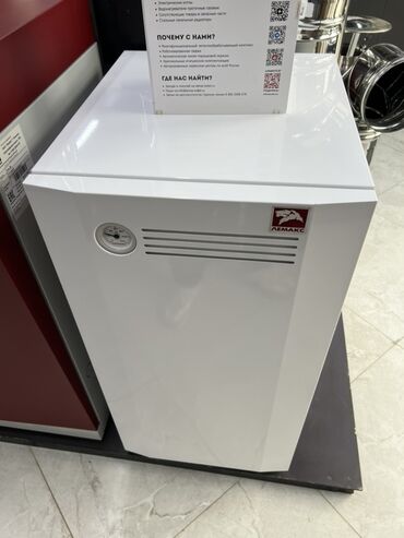 нагревательный элемент: Напольный газовый котел «Лемакс» в белом корпусе. Оснащен термометром