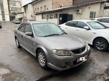 часы на машину: Mazda Familia: 2002 г., 2 л, Типтроник, Бензин