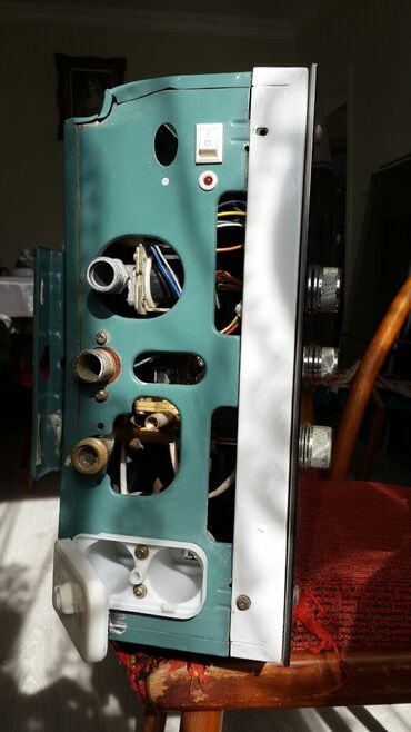 ремонт газовой колонки: TERMOLUX qaz su qızdırıcısı (geyzer) Xüsusiyyətlər: - Ön panel: şüşə