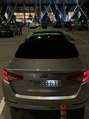 sonata fara: Kia Optima sedan kuzalı avtomobildir. Şəkillərdə avtomobil gümüşü — 6
