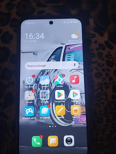ун басандаткыч: Смартфон Redmi 15 Ключевые характеристики: - Экран с центральным — 3