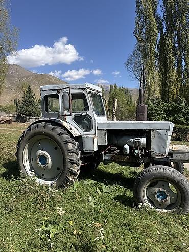 КУНы: Трактор колесный с кабиной Описание: - Полный привод: задний — 2