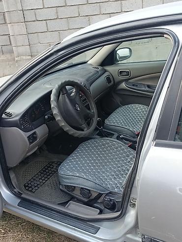 чехлы в авто: Nissan Almera: 2000 г., 1.5 л, Механика, Бензин, Хэтчбэк — 5