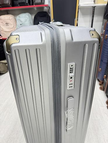 ice berlin: Жёсткий чемодан на колёсах, серебристый - Корпус: прочный жёсткий — 6