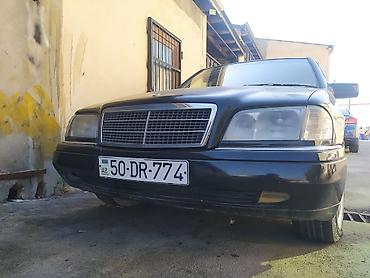 mercedes benz e250: Mercedes-Benz C180 sedan - Korpus: 4 qapılı sedan, qara rəng - Kuzov — 1