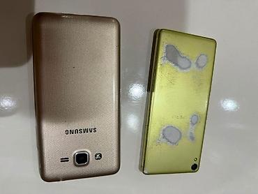 samsung s7230e wave 723: İki ədəd mobil telefon dəsti. 1) Samsung DUOS (ağ/gözəl qızılı arxa — 1