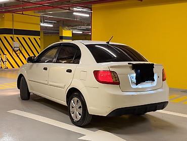 avtomobil az zil 130: Kia Rio: 1.4 л | 2010 г. Седан — 4