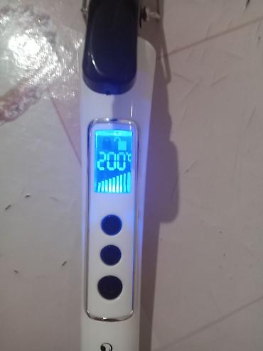 afro buruq: Saç burğusu - Temperatur tənzimi: 200°C-ə qədər; +/– düymələri ilə — 2