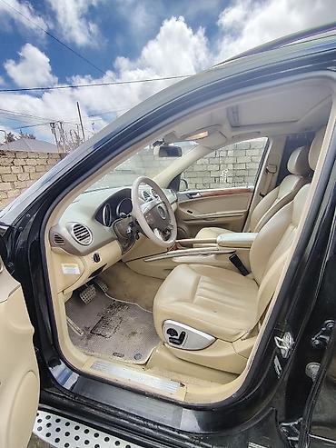 ag 07 sekilleri: Mercedes-Benz ML-Class (W164) SUV Xüsusiyyətlər: - Kuzov: 5 qapılı — 9