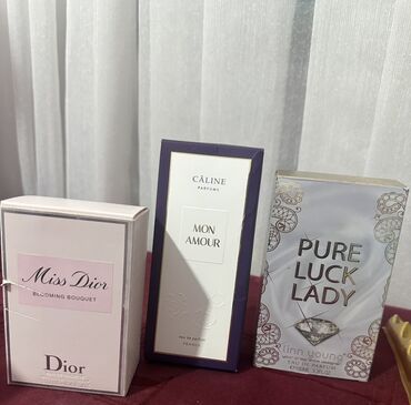 вечерние платья оранжевого цвета: Набор из трех парфюмов: Dior Miss Dior Blooming Bouquet, Câline Mon