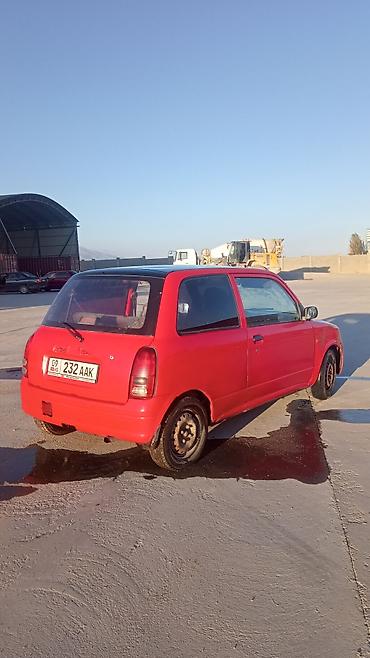 авто маркер: Daihatsu Cuore: 2003 г., 1 л, Механика, Бензин, Купе — 2
