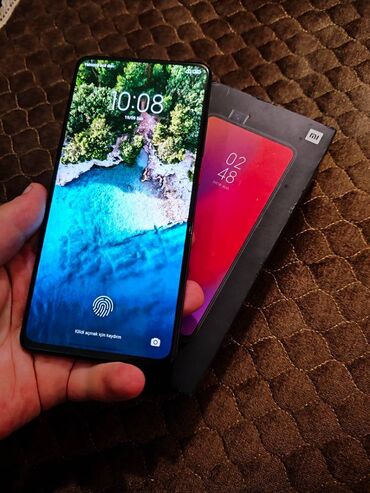 xiaomi mi 9t pro qiymeti: Xiaomi Mi 9T Pro, 64 GB, rəng - Qara, 
 Barmaq izi, İki sim kartlı, Face ID