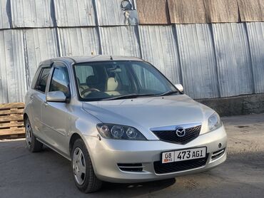 Mazda Demio 1.3 л. 2003 | 12345 км