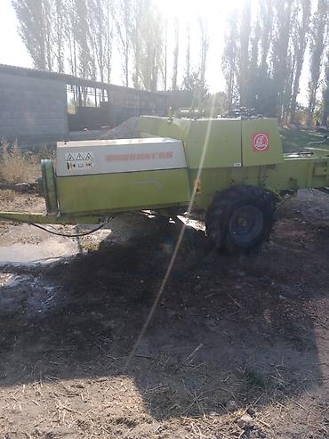 Тюкопресс-подборщик CLAAS Markant 65 Описание: - Пресс-подборщик для at lalafo.kg Тюкопресс-подборщик CLAAS Markant 65 Описание: - Пресс-подборщик для