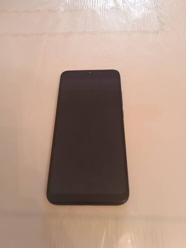 xiaomi black shark 2 azerbaycan: Xiaomi Redmi 7, 16 GB, rəng - Qara, 
 Sensor, Barmaq izi, İki sim kartlı