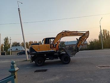 Экскаватор, Hyundai, 2010 г., Колесный