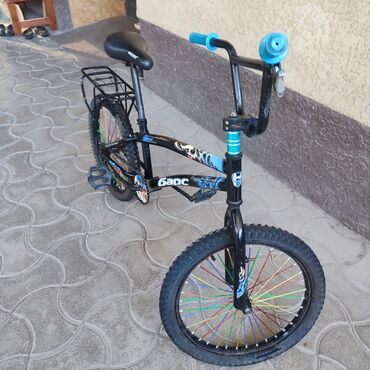 трехколесный велосипед поза: BMX велосипед, Колдонулган