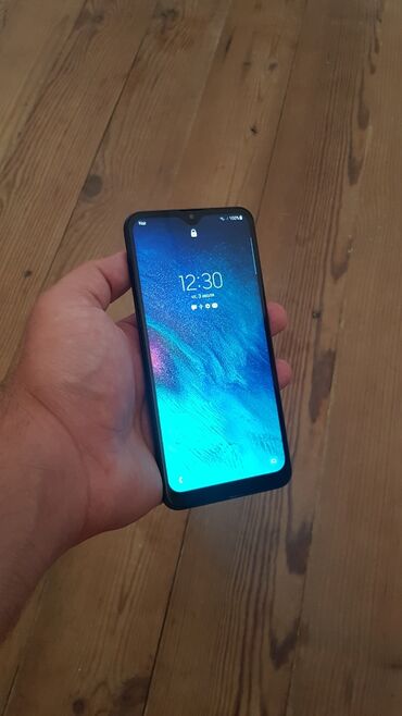 İnformatika: Samsung Galaxy A20, 32 GB, rəng - Göy, Sensor, Barmaq izi, İki sim kartlı