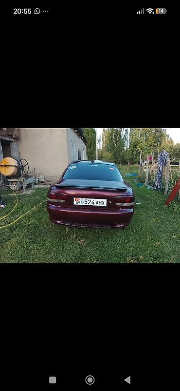 Унаа сатуу: Mazda MX-6: 1992 г., 2 л, Кол менен иштөөчү, Бензин, Лифтбек — 6
