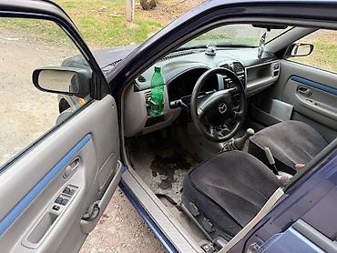 ann chery: Mazda Demio: 2001 г., 1.5 л, Механика, Бензин — 4